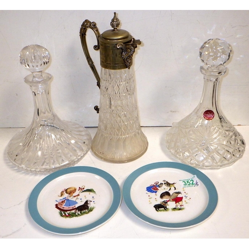 352 - A cut glass and silver plated claret jug; two ships' decanters; two matching nursey plates.  (5)