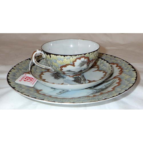 158 - A Japanese eggshell porcelain tea cup trio bearing signature to base, early 20th cent.
