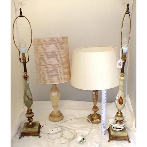 166 - A pair of onyx table lamps together with two further lamps (4)