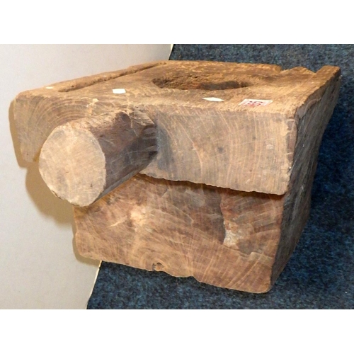 265 - Wooden block with handle and hole.