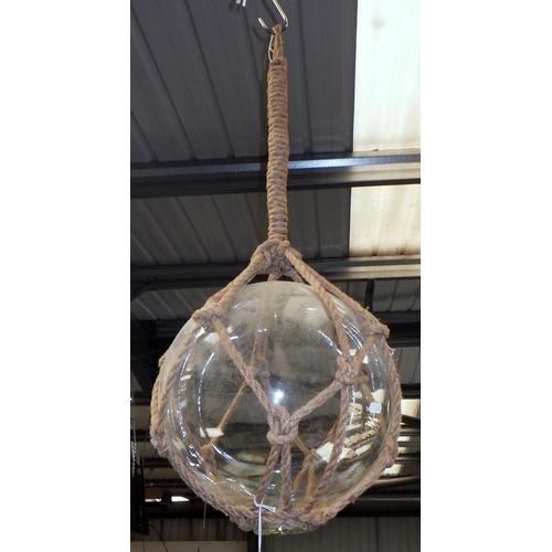 267 - Decorative hanging glass ball in rope