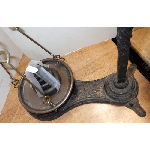 273 - Early 1900s grocer's beam scales with weighing pans and weights together with a wire folk art figure... 