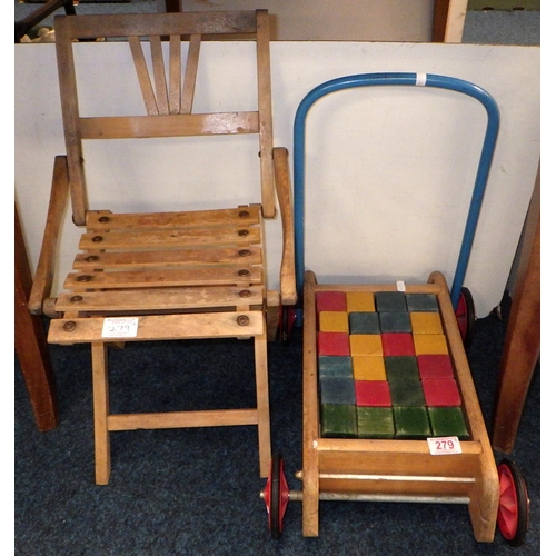 279 - Early 20th Century child's folding chair together with a vintage Triang baby walker with bricks (2)