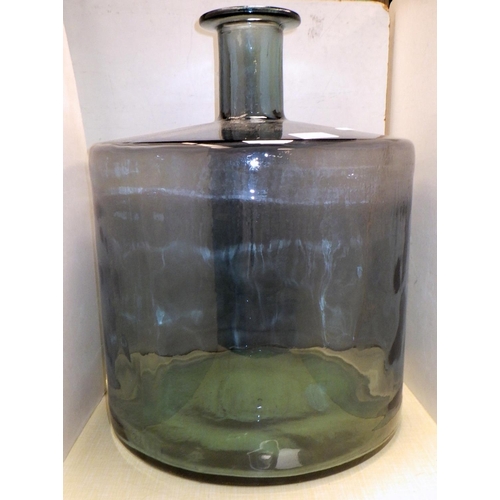 285 - A pair of large green jars together with a large squat bottle 45cm tall