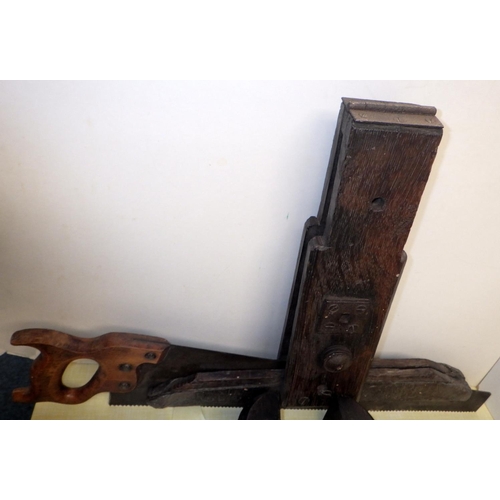 287 - A large vintage vice together with a saw etc (4)