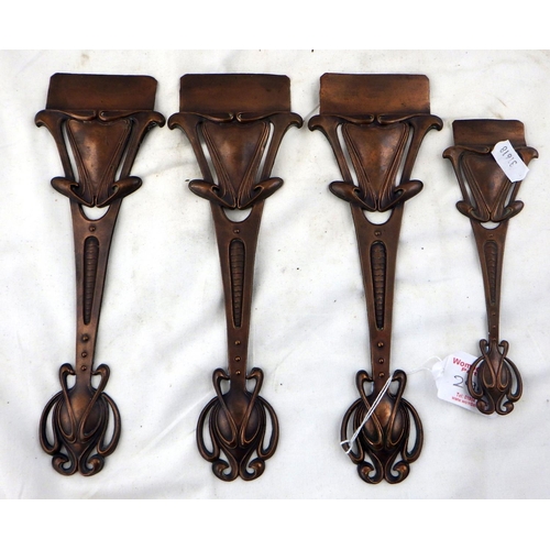 294 - A plated metal candelabra in the style of Archibald Knox (af) together with 4 Art Nouveau copper hin... 