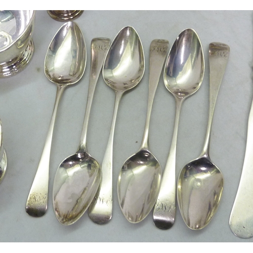 13 - A harlequin set of six George III silver teaspoons engraved with matching monogram; an early 19th ce... 