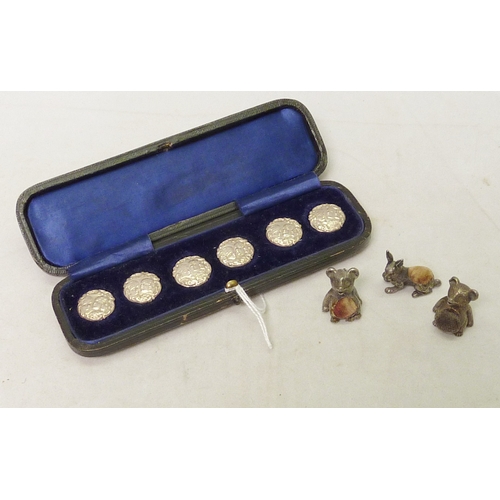 37 - A cased set of six silver cherub design buttons, Levi & Salaman, Birmingham 1904; three novelty pin ... 