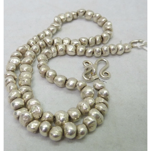 40 - A Pruden & Smith silver nugget necklace, 400mm long.