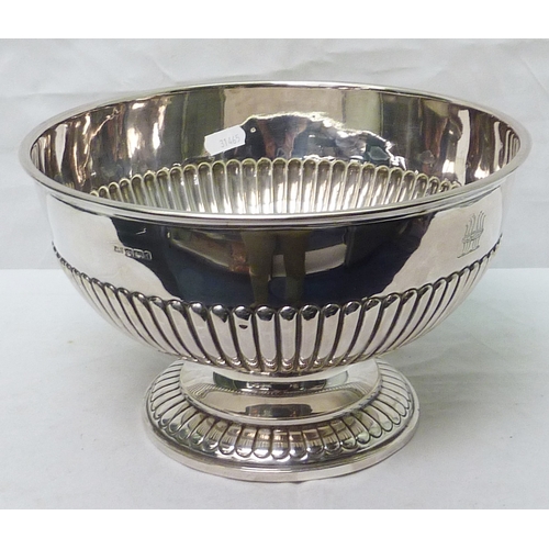 1 - A late Victorian silver punch bowl, Alexander Clark, Sheffield 1898, bearing engraved snakes in gart... 