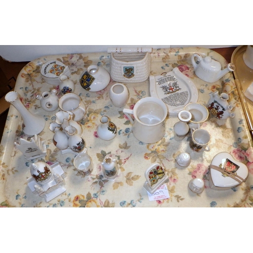 309 - A quantity of crested souvenir china miniatures (2)