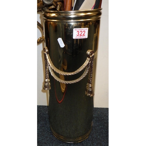 322 - A brass stick stand and sticks together with brass fire dogs etc