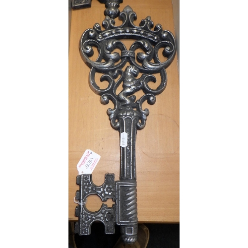 331 - Two American Art Deco aluminium balusters together with two decorative aluminium keys