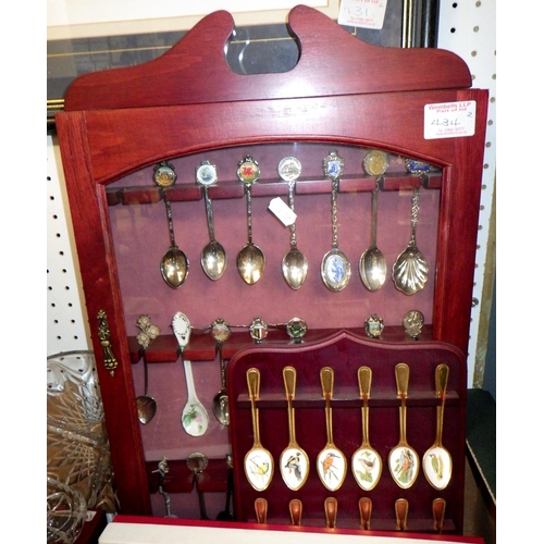 434 - A Community Plate canteen of cutlery together with a spoon collection in a display case and rack etc... 