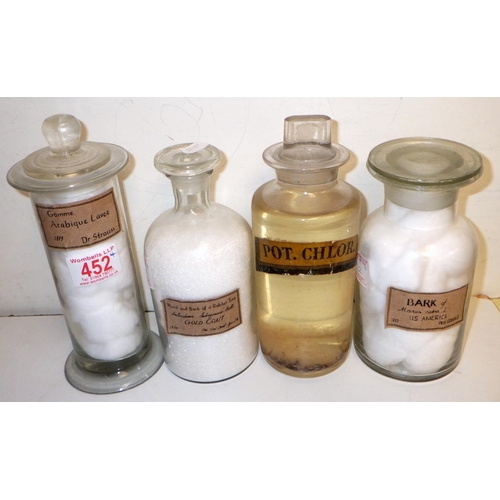 452 - Four chemist jars (2)