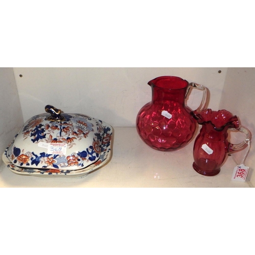 368 - Two pieces of cranberry glass, both a/f; a Mason's Ironstone square covered dish. (3)