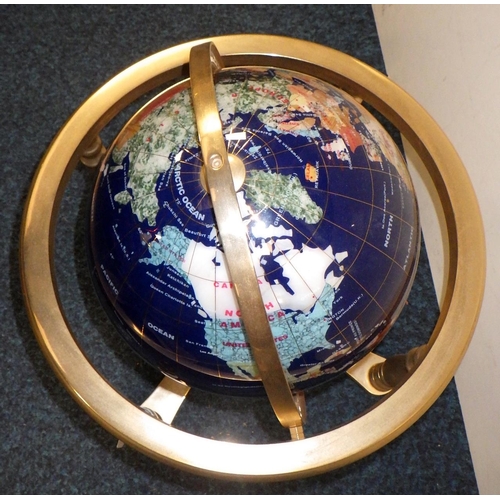 372 - A table top globe on metal stand 45cm tall