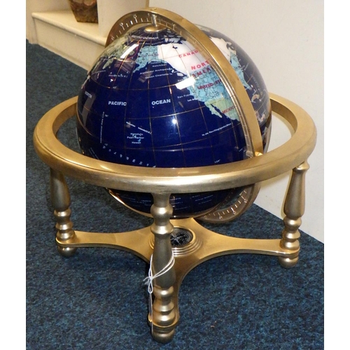 372 - A table top globe on metal stand 45cm tall