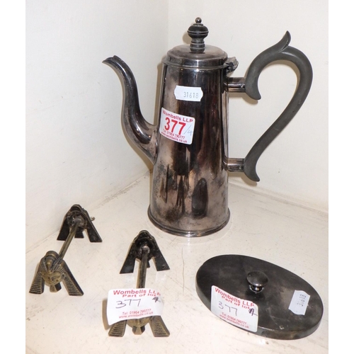 377 - Two Egyptian style knife rests and a metal paperweight together with a silver plated coffee pot (4)