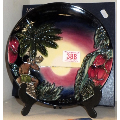 388 - A Moorcroft Pottery tropical beach motif plate, boxed.