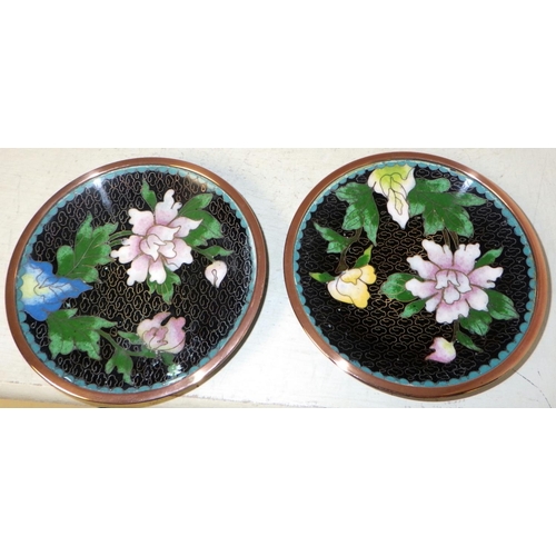 389 - A cloisonne plate on wooden stand together with a pair of small cloisonne dishes (3)