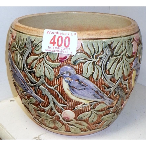 400 - A fulper  pot decorated with birds and foliage stamped Weller on base.