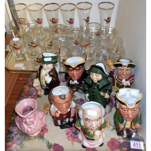 411 - A quantity of toby jugs including Staffordshire together with various pheasant decorated glasses af ... 