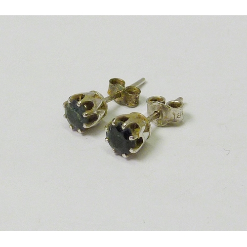 106 - A pair of blue sapphire stud earrings, 18ct white gold.  5mm / 1.5g gross.