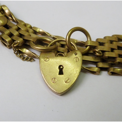 68 - A gate bracelet, 9ct gold.  Approximately 190mm long / approximately 13g