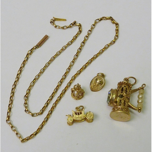 70 - Four 9ct gold bracelet charms, the lantern 32mm tall, 12g gross together; a chain link necklace, yel... 