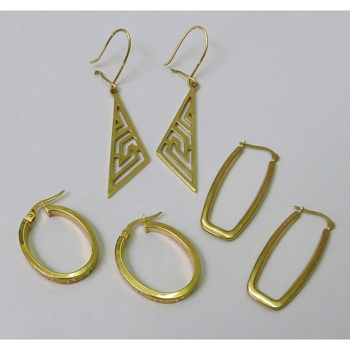 74 - A pair of late 20th cent droplet earrings of pierced triangular design, yellow metal marked 585, 55m... 