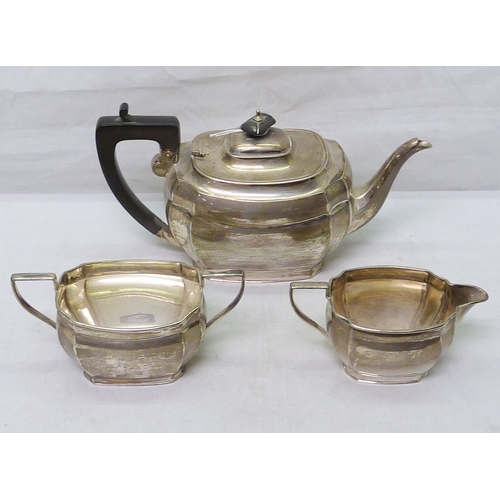 81 - A silver three piece tea set comprising teapot, milk jug and sugar bowl, Sheffield 1930.  Teapot 272... 
