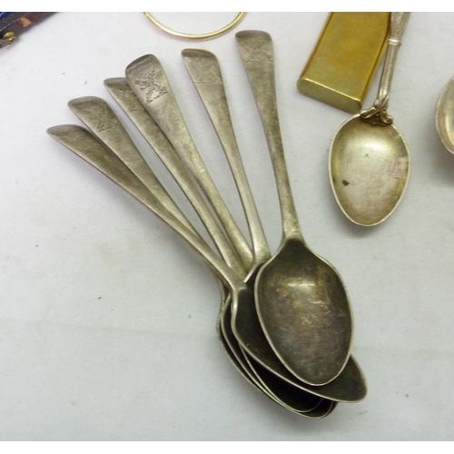 83 - Six matching silver teaspoons having engrave armorial to ends, 105g / each 125mm long; an oriental b... 