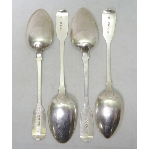 17 - Four Victorian silver fiddle pattern table spoons, Charles Boyton, London 1840 & 1845.  224mm long /... 