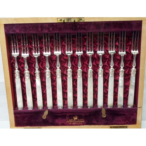 21 - A cased canteen of Victorian silver plate and mother of pearl fruit cutlery, some a/f; three contine... 