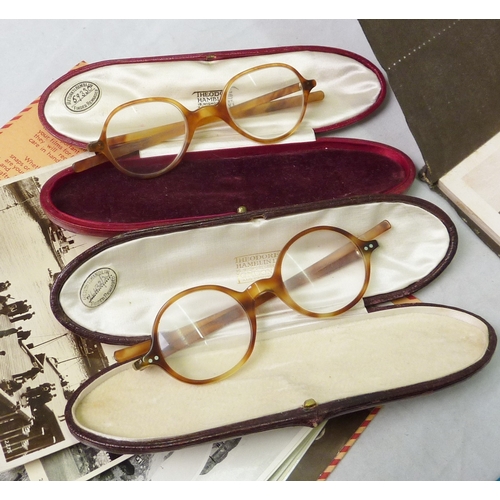 140 - A collectors lot comprising two pairs of early 20th cent tortoiseshell spectacles each contained in ... 