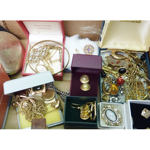 79 - A qty of costume jewellery and watches.