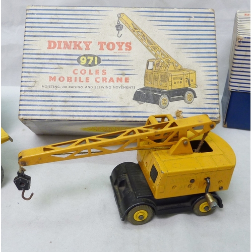 145 - Dinky Toys die-cast vehicles including three boxed Supertoys being a 965 Euclid Dump Truck, a 962 Mu... 