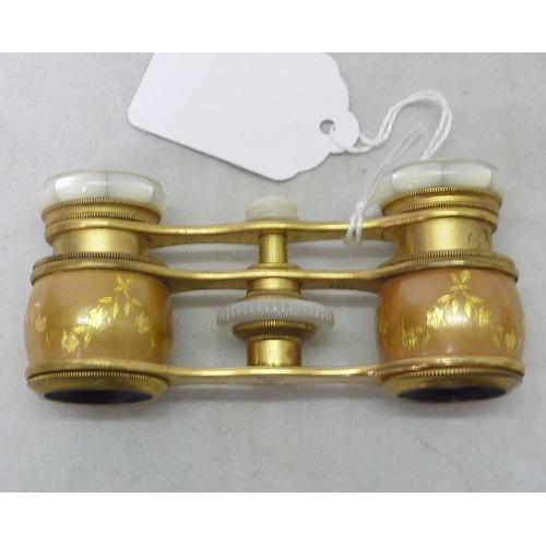 148 - A pair of Colmont Paris opera glasses, no case, 90mm across; a pair of Order of the British Empire c... 