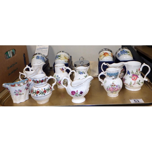 53 - A collection of Royal Worcester jugs and egg coddlers