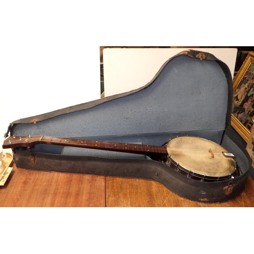 191 - A cased banjo