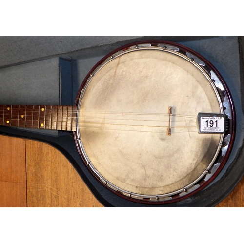 191 - A cased banjo