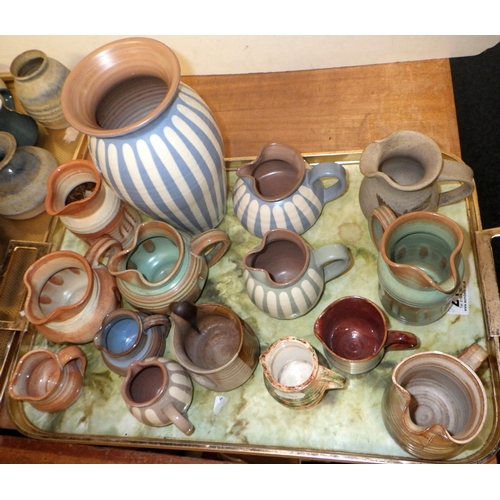 211 - A large collection of Art pottery jugs etc to inc Prinknash (2)