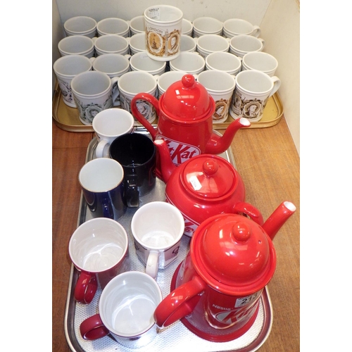 213 - A qty of various Denby mugs together with KitKat tea pots etc (2)