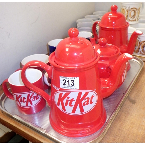 213 - A qty of various Denby mugs together with KitKat tea pots etc (2)