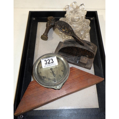 323 - A bronze desk seal, c1900, 90mm tall; a cut glass inkwell; an iron address stamp; a Smith's motoring... 