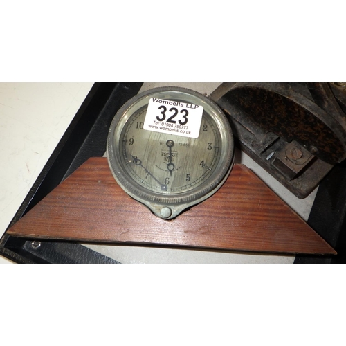 323 - A bronze desk seal, c1900, 90mm tall; a cut glass inkwell; an iron address stamp; a Smith's motoring... 