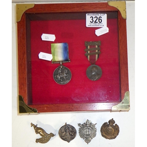 326 - A WWI British War Medal; a LCC King's Medal; four badges