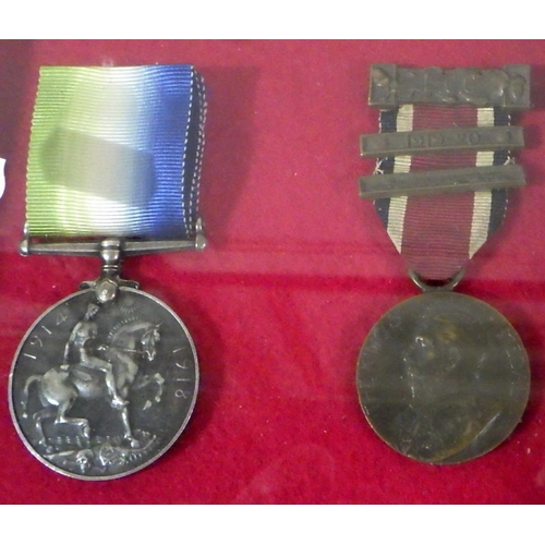 326 - A WWI British War Medal; a LCC King's Medal; four badges