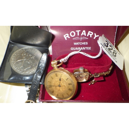 328 - A pocket watch, having a pin set movement in a yellow metal front and back case marked 18k, 38mm acr... 